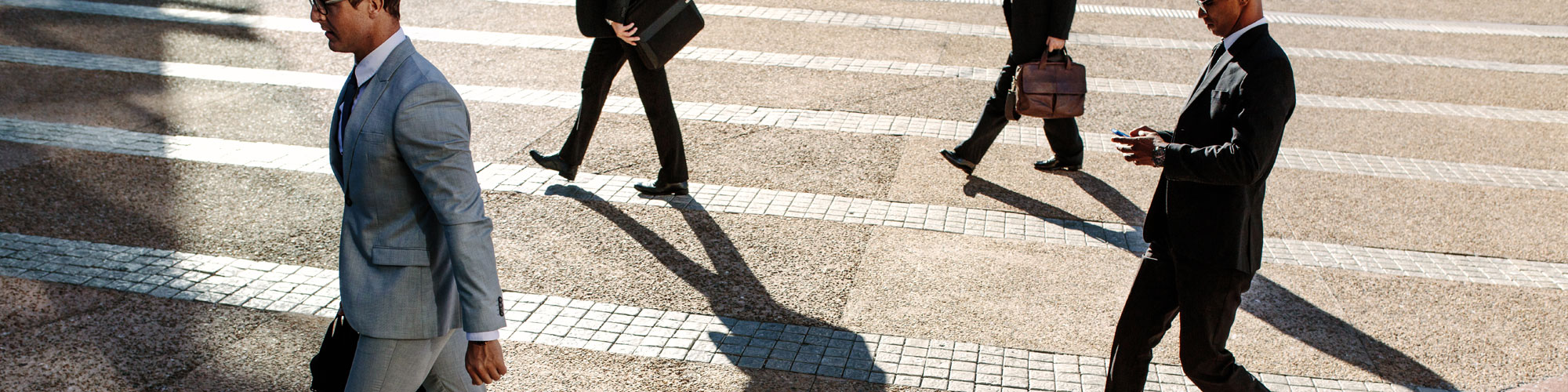 People In Suits Walking
